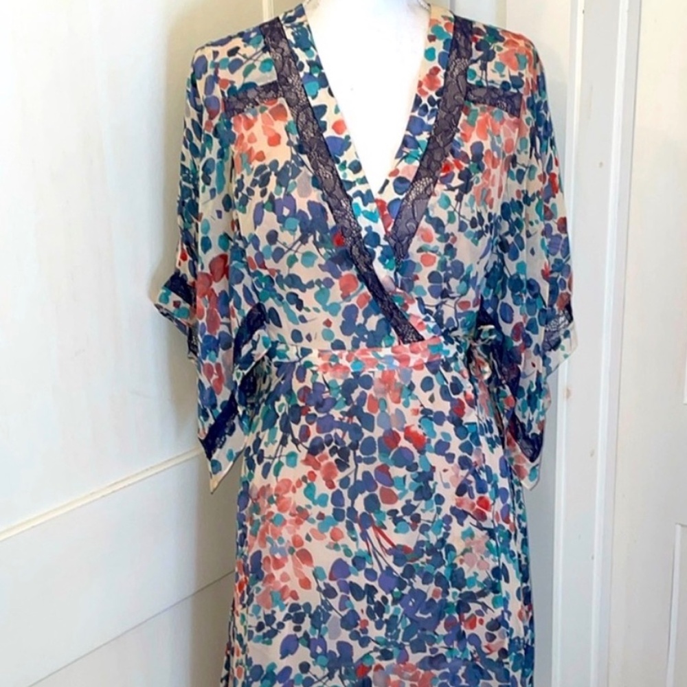 This item is a BCBGMAXAZRIA floral wrap dress Size Small